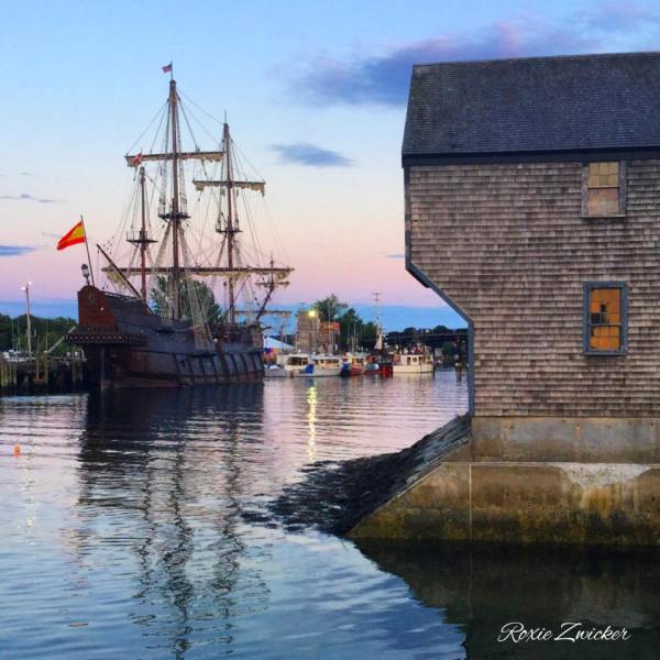 A view of a ship sitting in the harbor