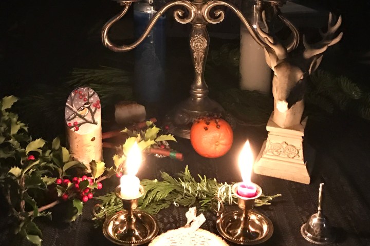 a birthday cake with lit candles