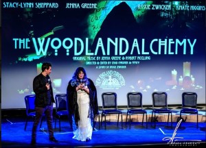 a group of people standing in front of a sign